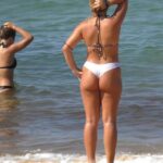Beautiful Teens Playing on the Beach in Bikinis