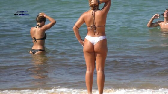 Beautiful Teens Playing on the Beach in Bikinis