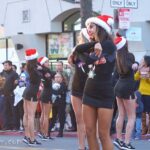 Group of Women in Tight Mini Dress at Festival