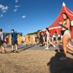 Beautiful Girl in Sexy Dress at a Festival