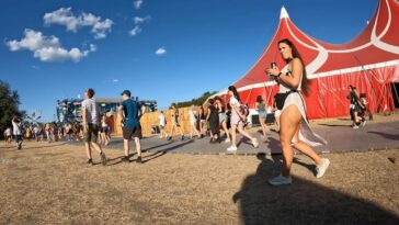 Beautiful Girl in Sexy Dress at a Festival