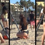 Beautiful woman playing on the beach