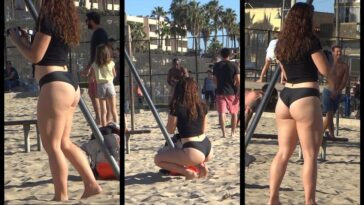 Beautiful woman playing on the beach