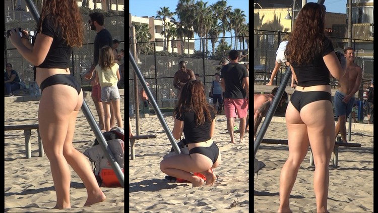 Beautiful woman playing on the beach