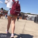 Teen in short sexy legs at school