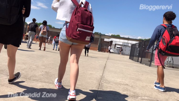 Teen in short sexy legs at school