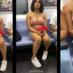 Onlycandids Brunette with Sexy Downblouse in the Subway
