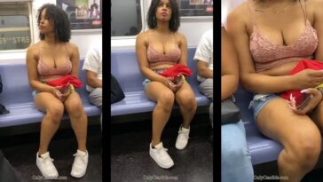 Onlycandids Brunette with Sexy Downblouse in the Subway