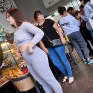 Scratchy Shooter Cute Woman in Gray Spandex with Big Hips