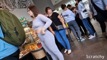 Scratchy Shooter Cute Woman in Gray Spandex with Big Hips