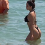 Amazing Young with Sexy Big Booty in Black Bikini in the Beach