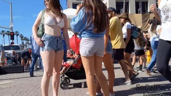 Group of Sexy Friends in Mini Shorts with Beautiful Legs Walking