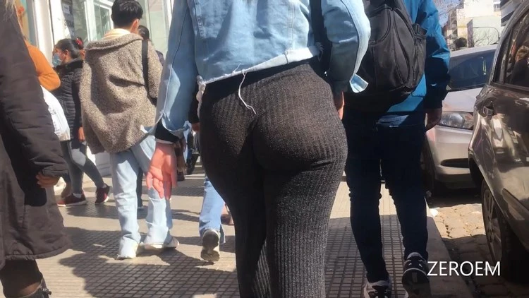A Woman Turning Heads in Sexy Booty Gray Pants